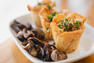 Baluchons de brie et coulis de champignons